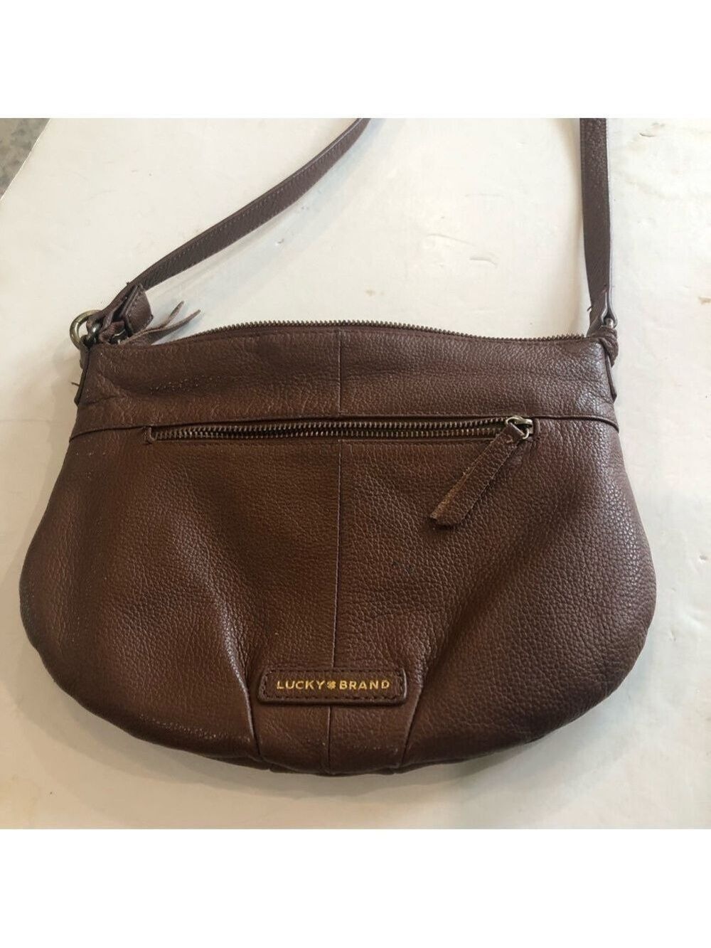 Lucky Brand brown pebbled leather shoulder/crossbody bag with tassel pockets